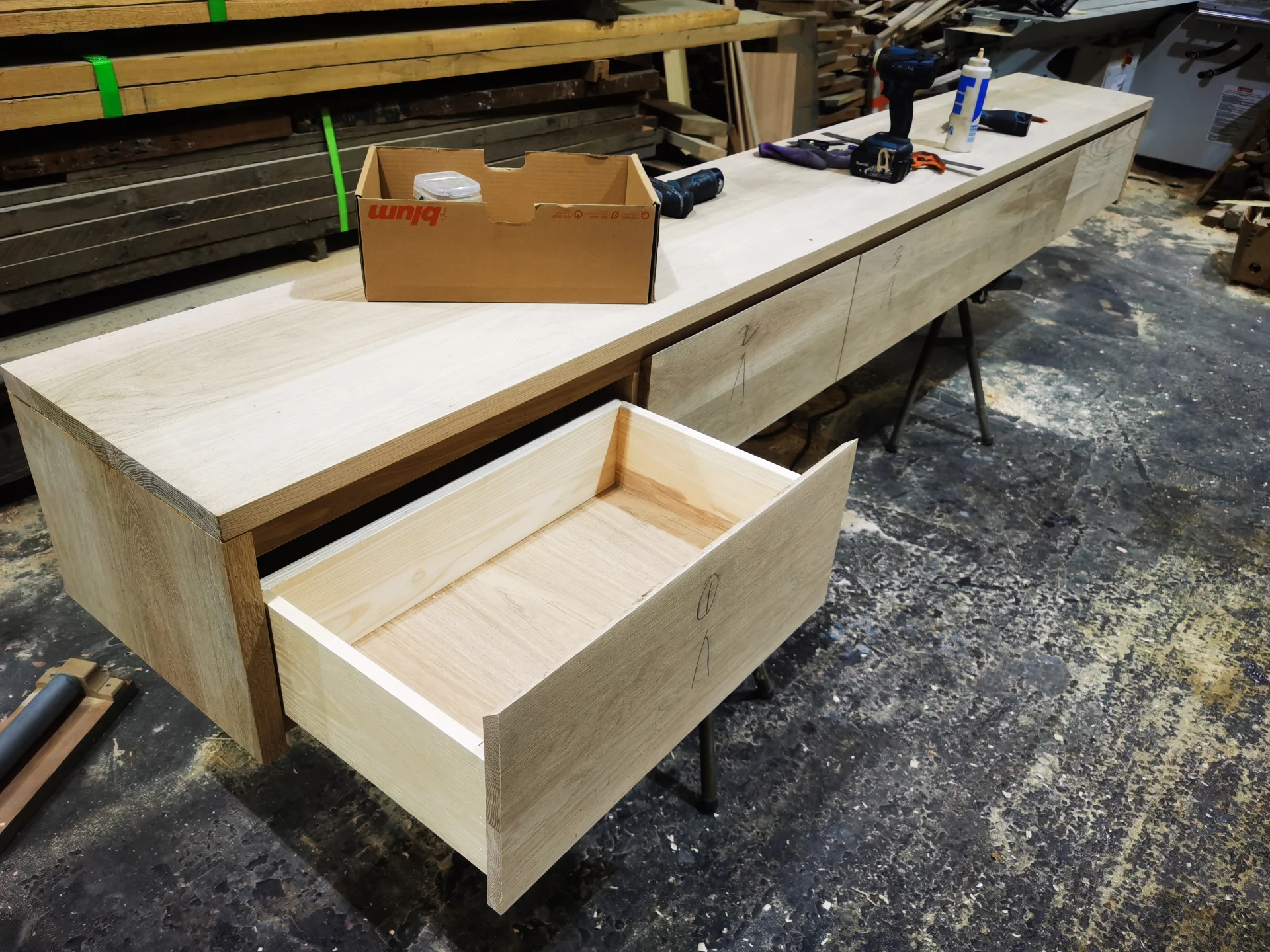 Ash TV unit in black PU — Progress photo