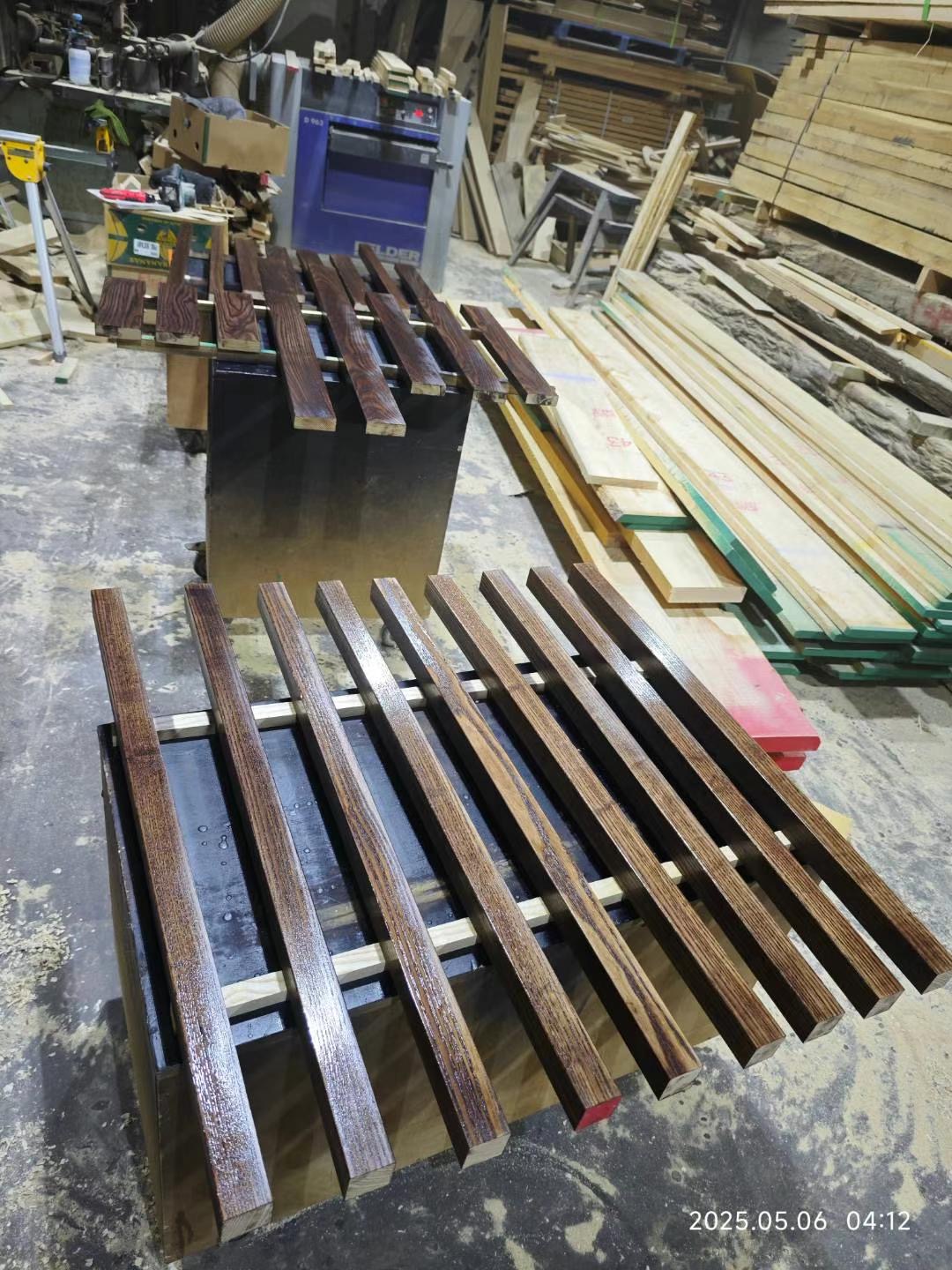 Individual slats being prepared and finished in the workshop