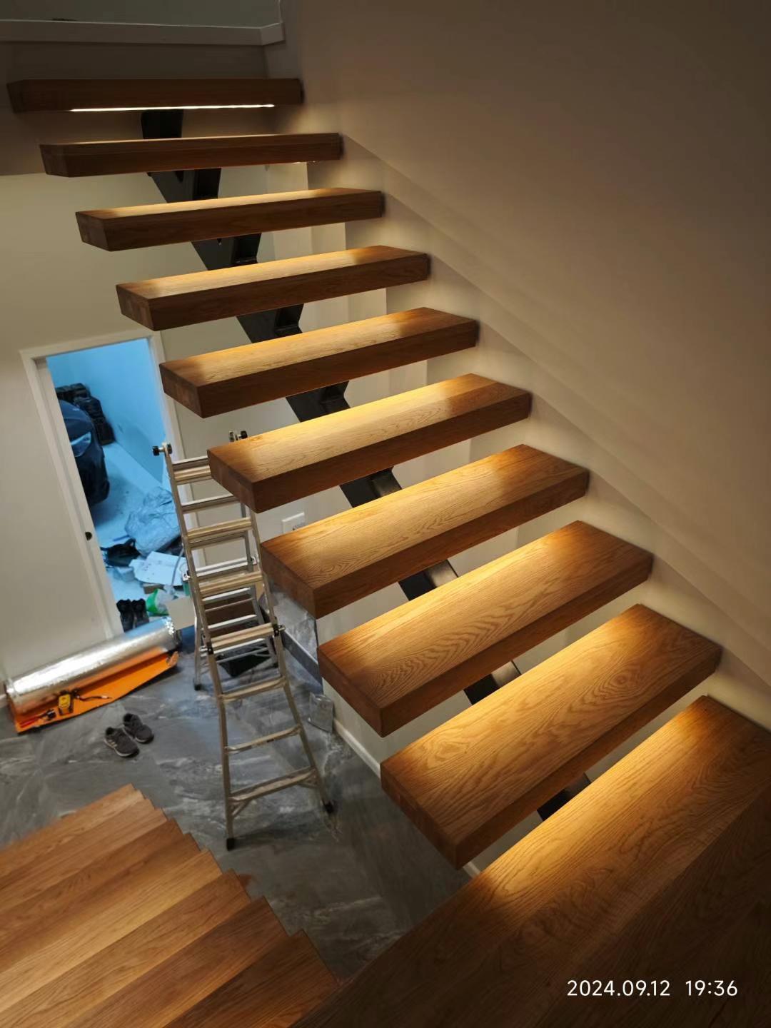 Solid timber treads with steel bracket detail