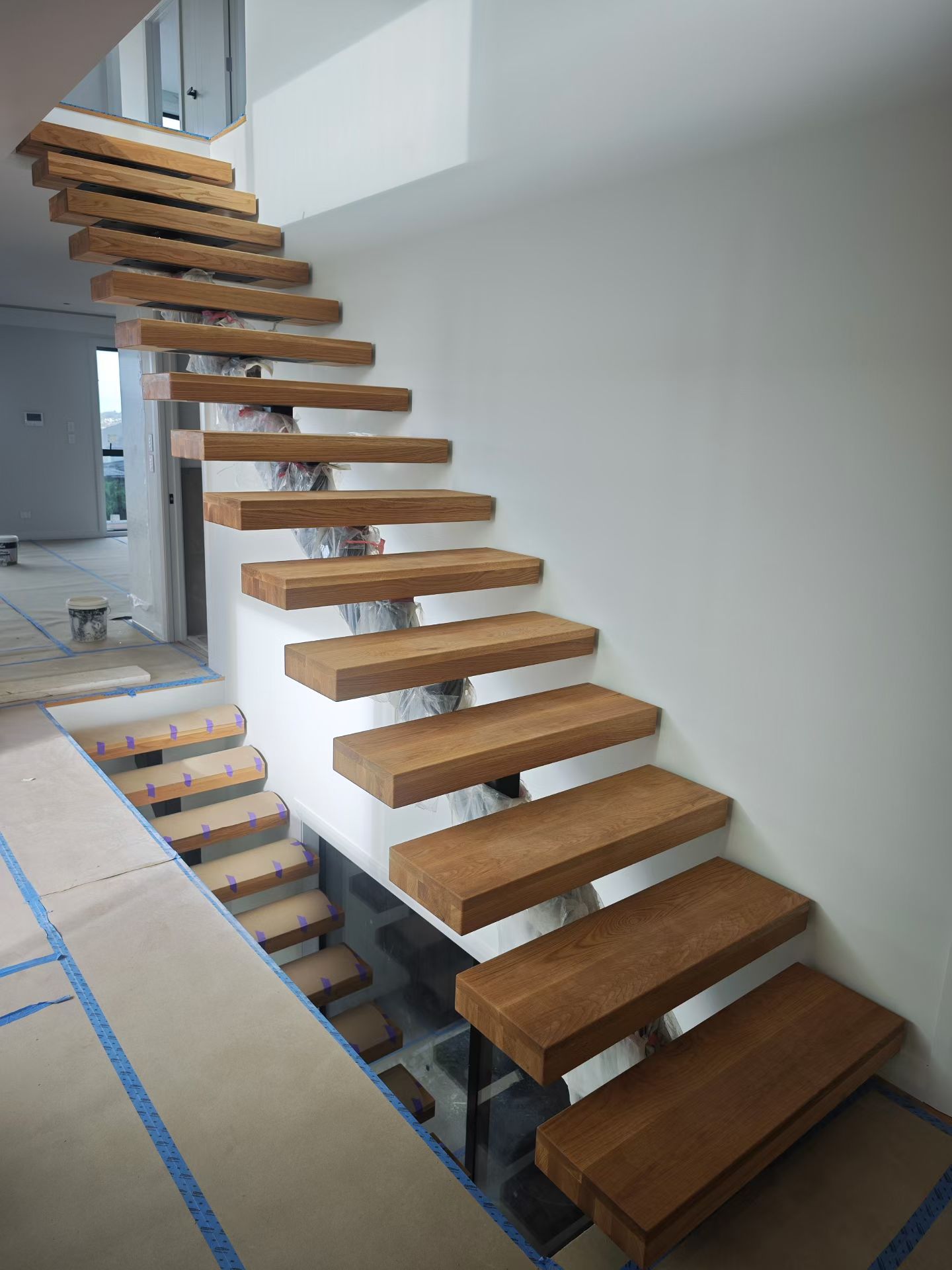 Completed staircase with solid timber handrail