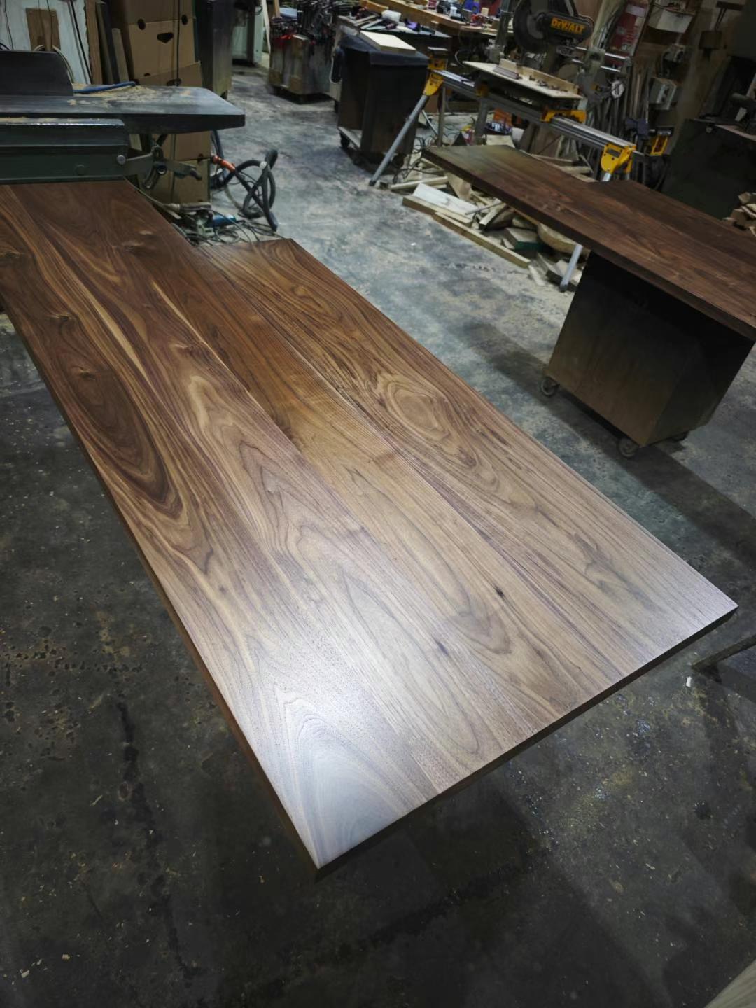 Solid timber table slab being prepared