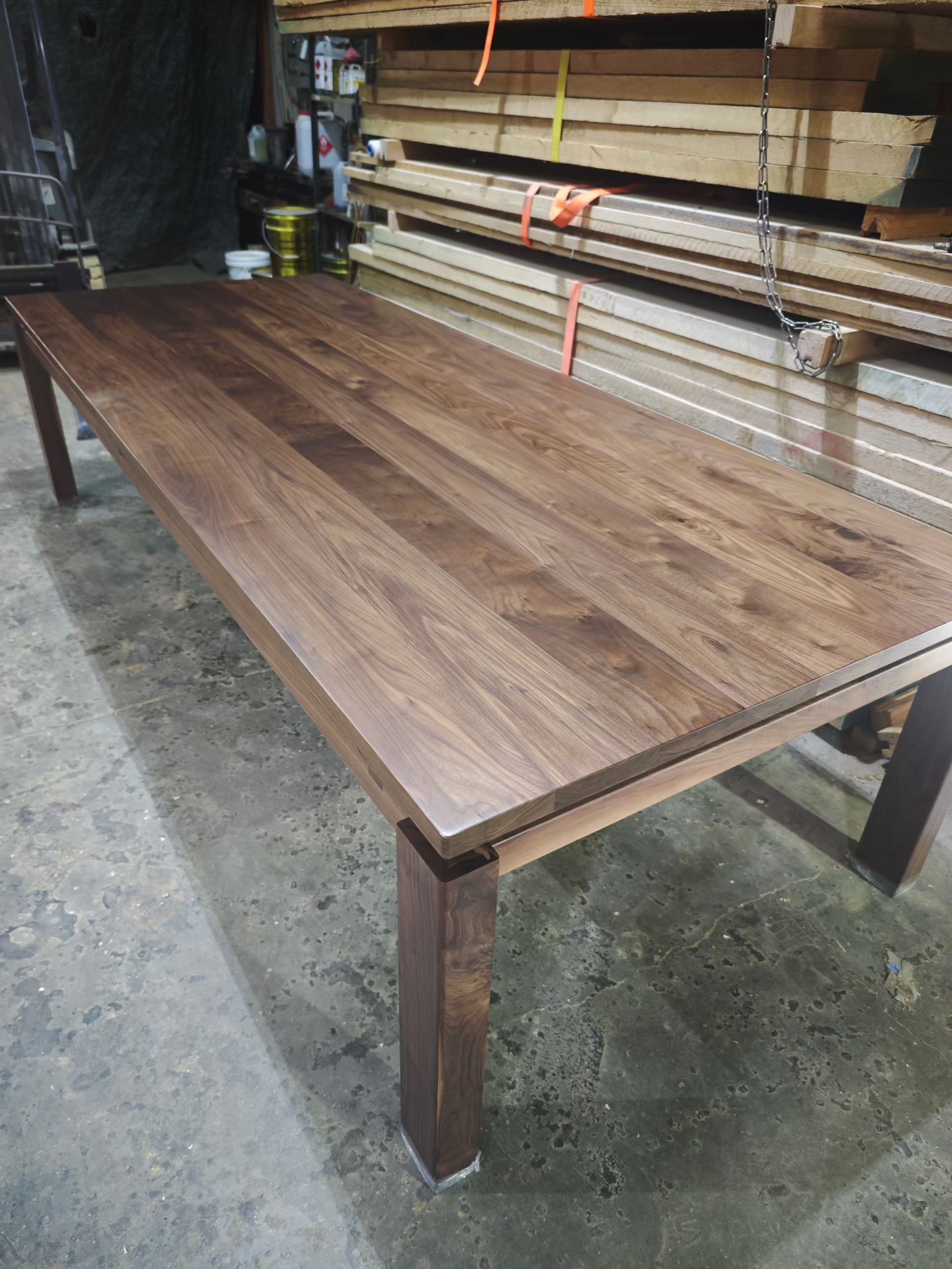 Finished solid wood table with natural edge