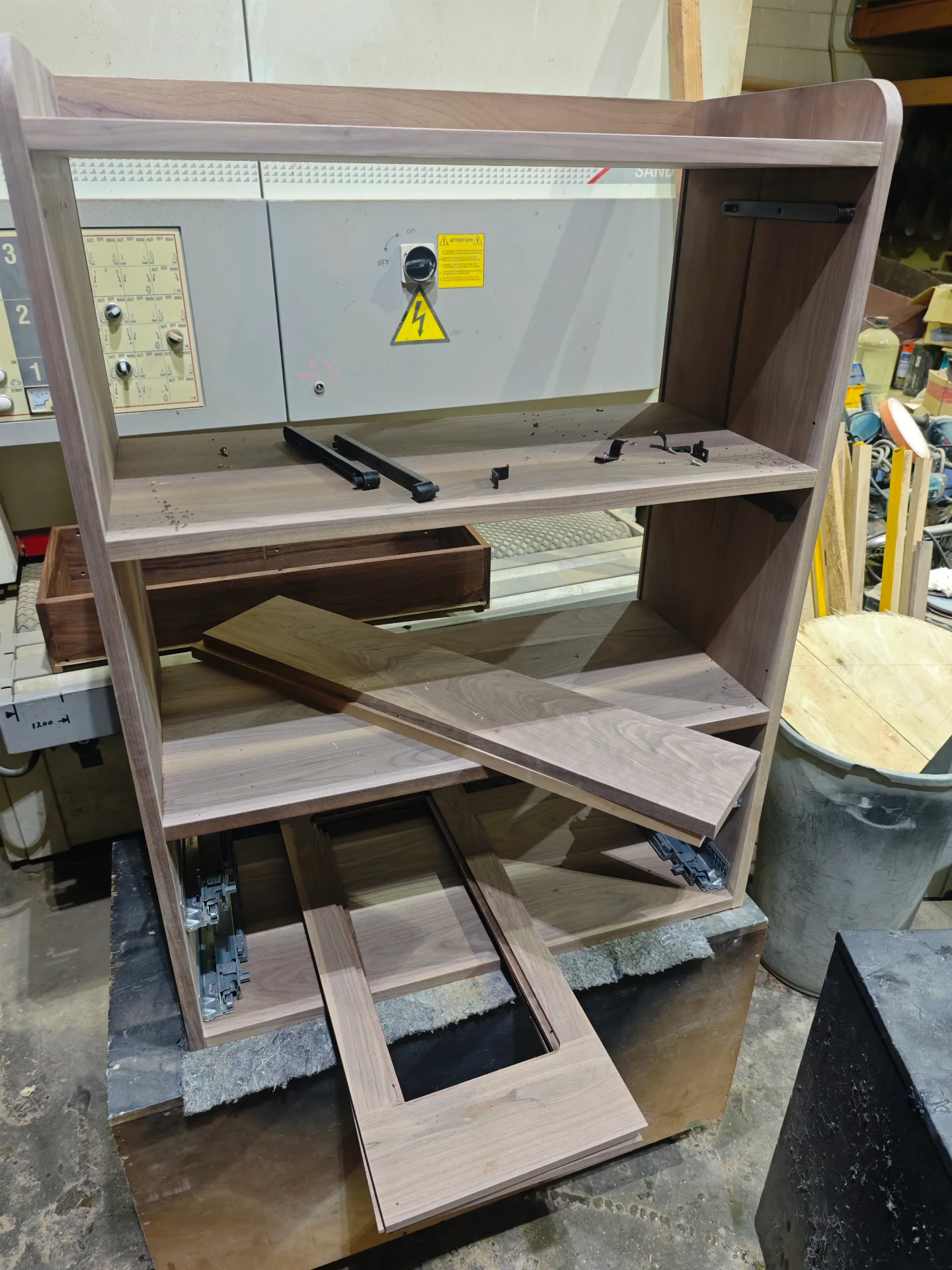Black walnut cabinet carcass and drawer components during dry fit