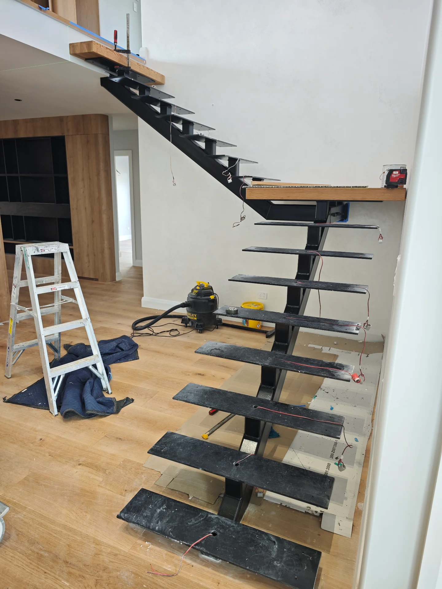 Custom white oak stair treads and landing — Progress photo